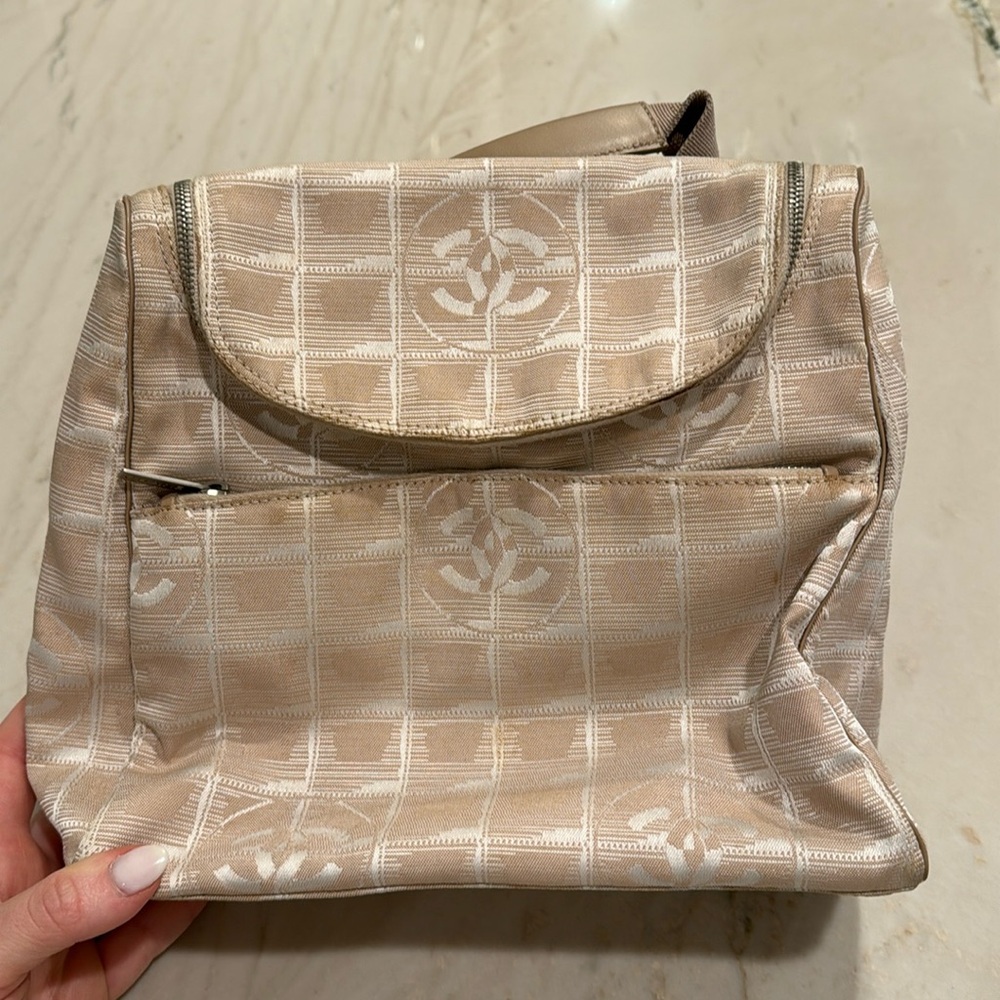 Chanel travel line bag beige silver backpack convertible crossbody w 2 pockets